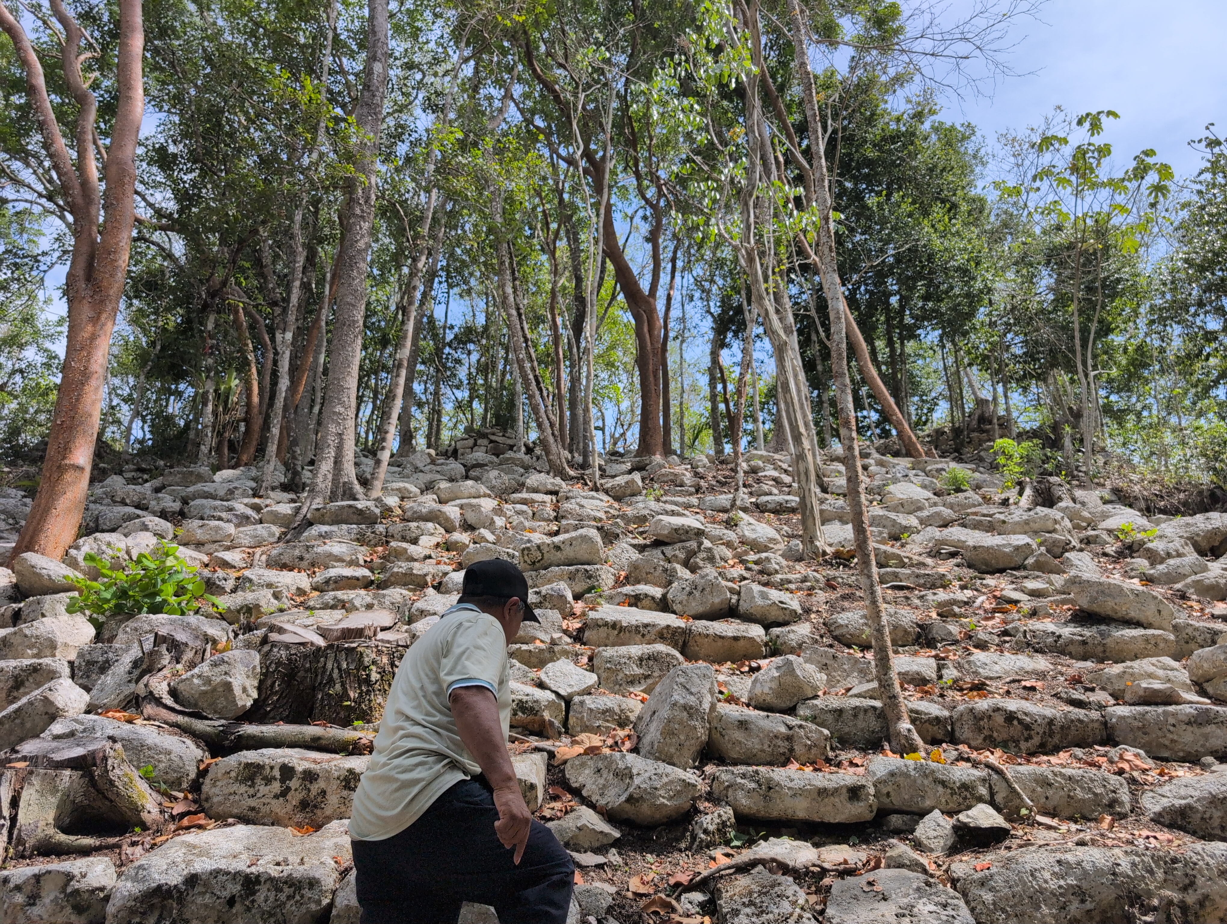 Climbing hidden Maya pyramid archaeological site Tulum cultural tour